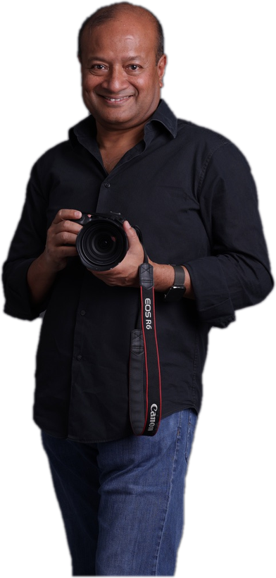 Sohail Hasnie holding a camera